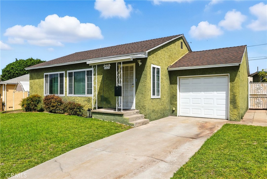 Run, don’t walk — this charming 3-bedroom, 1-bath home in the heart of Monterey Park won’t last!
Step inside to a bright, inviting floor plan filled with natural light. The cozy living room flows into a kitchen ready for your personal touch. Two bedrooms and a full bath are conveniently located on one side of the home, with an additional private bedroom tucked toward the back — perfect for guests or a home office. An attached one-car garage offers direct access to the kitchen and a washer and dryer for ease and convenience.
This well-maintained single-story residence sits on a generous lot with endless possibilities. The spacious backyard is ideal for entertaining, gardening, or expansion — including the potential to add an ADU (Accessory Dwelling Unit) for multi-generational living or extra rental income.
Located in a highly desirable neighborhood, you’ll enjoy unbeatable convenience — just minutes from Quiet Cannon, Topgolf, shopping centers, restaurants, movies, and local parks. Commuters will love the easy access to the 10, 710, and 60 freeways, putting you less than 15 minutes from Downtown Los Angeles, Cal State LA, and vibrant nearby cities like Alhambra and Pasadena.