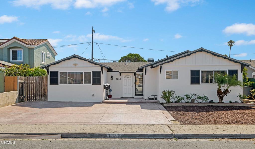 Move-In Ready 4-Bedroom Home in Oxnard - Upgraded & Full of Potential!Welcome to this beautifully updated 4-bedroom, 2-bathroom home in the heart of Oxnard! With tasteful upgrades throughout, this move-in ready property offers both comfort and style.The spacious kitchen boasts elegant natural stone countertops, neutral-toned cabinetry, a sleek stainless steel stove, and a built-in dishwasher for added convenience. Easy-to-maintain ceramic tile flooring flows seamlessly throughout the home, providing a clean and modern touch.Enjoy open-concept living in the expansive family and dining room combo, perfect for entertaining. The family room features recessed lighting, crown molding, and a cozy, real wood-burning fireplace--ideal for relaxing evenings.Retreat to the main bedroom with a private en-suite bathroom showcasing a stunning ceramic tile shower and an upgraded vanity. The second bathroom is equally impressive with a modern tub/shower combo and contemporary fixtures.All four bedrooms are generously sized, offering flexible living space for family, guests, or a home office. The detached two-car garage offers additional potential--easily convertible into an ADU or guest suite for extra income.Situated on a spacious lot with alley access, this property features a stamped concrete front driveway that adds curb appeal and character. With endless possibilities and investment potential, this is a must-see opportunity