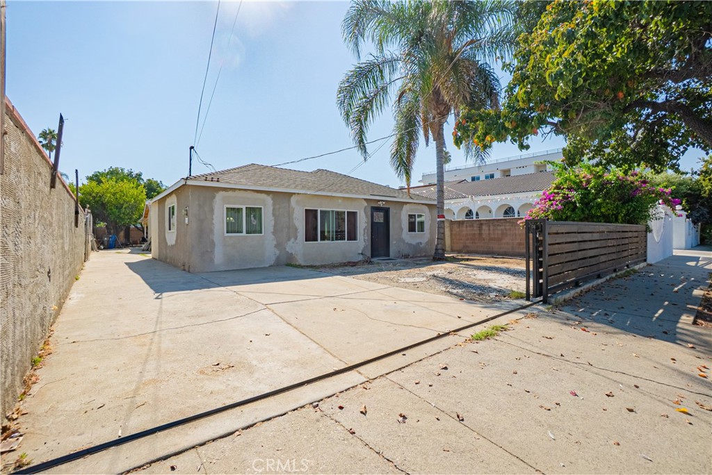 Probate Listing in Canoga Park for Sale! This 2-bedroom 1 bath home has a large 7500 sq. ft. lot with upgrades like new flooring and paint. Zoned LAR2 and an uncompleted project with lots of potential. Kitchen is not completed, and office was a garage and non-permitted in front home. Rear unit is not permitted at all and has drainage issues. Los Angeles Unified Schools and under Rent Control. This is a probate listing that requires court confirmation and overbid process. Next door to church and commercial areas. Buyer to investigate no guarantees from seller or listing agent.