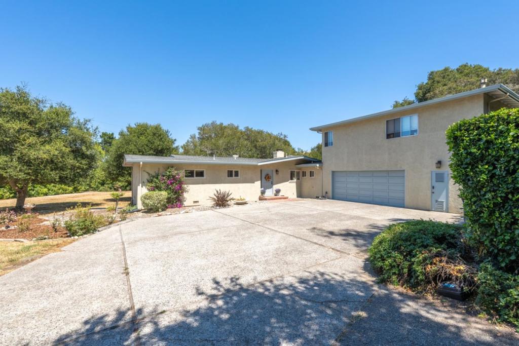 Escape to this charming 3-bed, 2.5-bath country retreat on .9 flat acres off Highway 68, minutes from Monterey and Salinas. This private lot boasts a spacious 2-car garage with ample room for oversized vehicles and potential for additional structures like a car barn (buyer to confirm with county). The inviting home features an open layout, ideal for cozy gatherings, with a generous backyard perfect for outdoor living. Surrounded by serene landscapes, yet offering easy access to coastal attractions, dining, and city conveniences, this property blends rural tranquility with urban proximity. A rare opportunity to create your dream country estate!