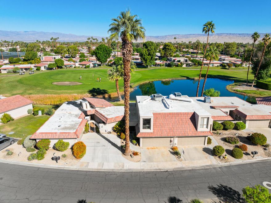 Spacious, furnished Townhome in the Cathedral Canyon Country Club located next to a picturesque lake.If you're looking for lots of space in a country club atmosphere, this is the condo for you. The ground floor features a large living room opening to a serene patio with fantastic views across the lake, rolling green golf course and the spectacular mountains beyond. There is a well appointed kitchen and dining area. The garage has been converted into a huge den with full bathroom (390 sq ft that is not included in the 1505 assessed square footage).Upstairs you will find double master bedrooms with walk in closets and en suite bathrooms. One has an office area with far reaching mountain views, and the other has a stunning terrace looking over the lake.A new roof, new decking, new HVAC and all the extra living space makes this property an excellent value. Come see it for yourself!Cathedral Canyon Country Club is a private, gated golf community with five pools and spas. This unit is a short walk to the clubhouse. Driveway parking and plenty of guest parking is available.The HOA is $550/month and the land lease is $298/month (land lease until 2061)