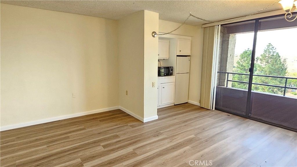 Photo of 24055 Paseo Del Lago #413, Laguna Woods, CA 92637 (MLS # OC26097216)