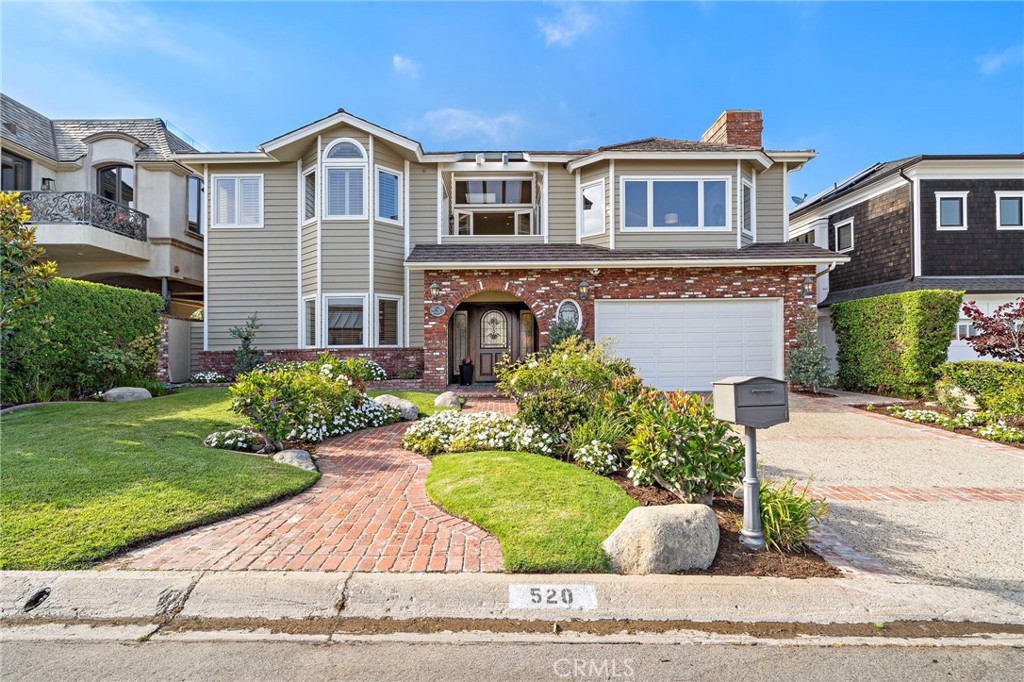 This exquisite 4 bedroom, 3.5 bathroom estate was designed by acclaimed Newport Beach architect Brion Jeannette in 1986. Seamlessly blending timeless elegance with refined sophistication, the home is thoughtfully curated with classic architectural details that infuse every space with warmth and character. The first level features a versatile and spacious layout, with 3 generously sized bedrooms that exude comfort and style and 2 newly remodeled full bathrooms. Additionally, a dedicated bonus room serves as a perfect space for a home office, media lounge or aa children's playroom. Ascend the elegant winding staircase to the 2nd level where the main living area and primary suite awaits you. The Chef's kitchen is a culinary masterpiece with Bosch and Subzero appliances, granite counter and a sea foam and sand inspired designer backsplash.The family room with fireplace & breakfast nook exudes warmth with breathtaking views of the harbor and beyond. For sophisticated entertaining, is a formal dining area. The living room is crowned with soaring ceilings, a fireplace and views. A secluded deck with serene harbor views is accessible from the main area and the primary bedroom. The primary suite is a private haven with water views, cedar lined walk in closet, spa inspired bathroom and a secluded office space. Large backyard with a sparkling pool and jacuzzi. A wine closet, storage room, extra large laundry, 2 car attached garage, central vacuum dumbwaiter and elevator makes this home a rare and radiant gem.