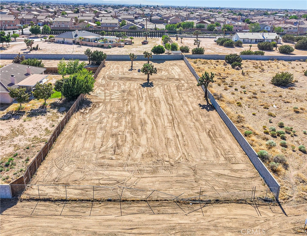 Seller Motivated – Price Reduced!!Prime Residential Lot Opportunity! Discover this spacious and level 0.76-acre parcel, ideally located in a quiet, well-established neighborhood within a rapidly growing area. Utilities are conveniently located within 100 feet of the property, including access to a 10-foot waterline easement. The lot is fully surveyed and flat, featuring a sturdy block wall along the back and one side, and fencing on the other side—offering complete privacy. A Composite Development Plan is already in place, allowing you to move forward with construction quickly and efficiently. Generous setback lines offer flexibility for your custom design. With its rectangular shape and generous dimensions, this property provides an exceptional blend of privacy, usability, and development potential. Enjoy unmatched convenience just five minutes from Highway 15—perfect for commuters—with schools, healthcare facilities, Walmart, Target, and popular restaurants all just minutes away. Whether you're a builder, investor, or future homeowner, this lot offers the perfect foundation for a custom home, ADU, or private estate. Build your dream home today! Buyer to verify all zoning and development information with the City.