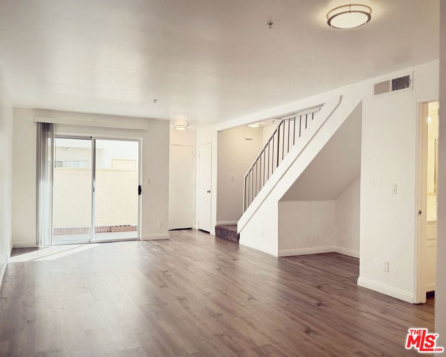 Beautifully updated and spacious 2-bedroom, 2.5-bath apartment in the heart of Van Nuys. Each bedroom includes its own private en-suite bath, plus an additional guest half bath. The open floor plan features a bright living and dining area, modern kitchen with stainless-steel appliances, central A/C & heat, and a private balcony. Close to shopping, dining, schools & easy freeway access.