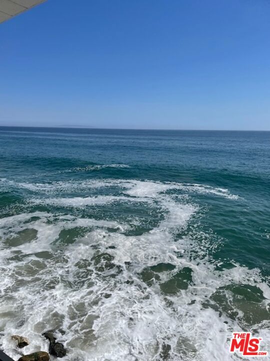 Wonderful updated 3 bedroom home. Watch the dolphins swim by from your private deck and enjoy the truly amazing views afforded by this property located close to all restaurants and shopping and close to the City. This is the best priced ocean front home you will find on the market today. Priced to lease
