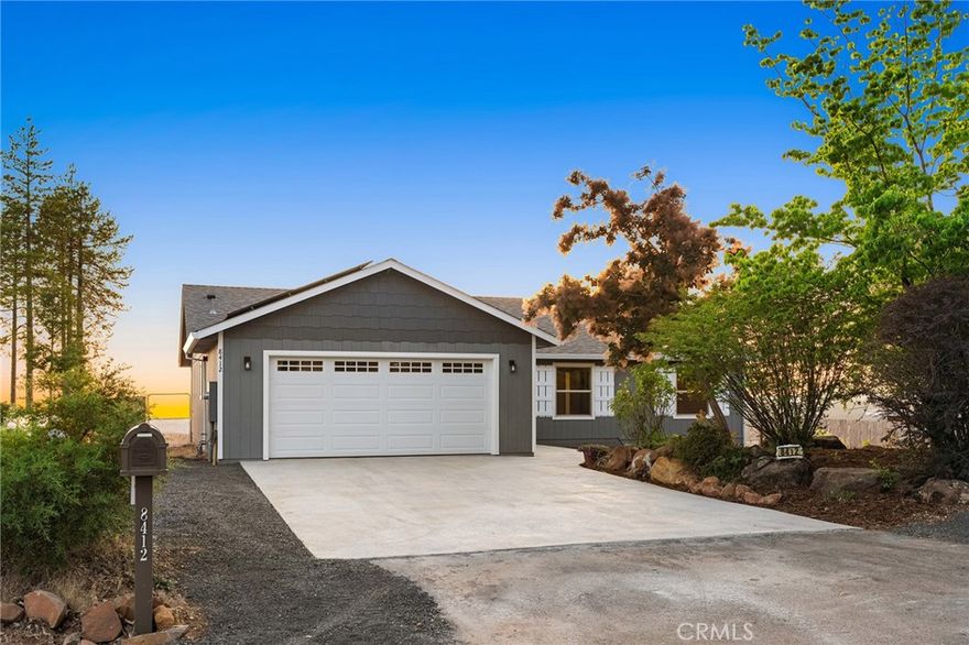 Wake up to breathtaking canyon views in this beautiful new home, thoughtfully built by a long-time local contractor in a highly desirable neighborhood offering stunning sunsets and so much more. This spacious 3-bedroom, 2-bath residence features modern amenities blended with comfort and charm

The kitchen is a chef’s dream, boasting quartz countertops, custom cabinetry, stainless steel appliances, and a convenient breakfast bar. The bright living room showcases spectacular views and provides direct access to the deck and fully fenced backyard—perfect for relaxing or entertaining.

The primary suite is a true retreat with expansive views, a walk-in closet complete with built-ins, and an elegant bathroom featuring a step-in shower and double sinks. Two additional generously sized bedrooms share a well-appointed hall bath. Additional highlights include a spacious laundry room, walk-in hall storage closet, efficiency and owned solar panels for energy savings. Enjoy peace of mind and privacy with a fully fenced yard, making this home perfect for families and pets alike. Located in beautiful Paradise where the outdoor adventures are endless yet just a 20-minute drive from Chico/HWY 99, this location is ideal! Don’t miss the opportunity to make this exceptional home yours! Home features a NEW septic and leach field for a 3 Bedroom home