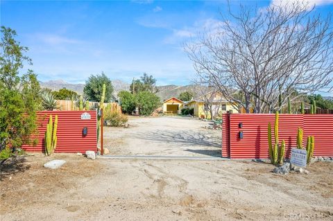Photo of 49570 Park Avenue Ave, Morongo Valley, CA 92256 (MLS # JT26002872)