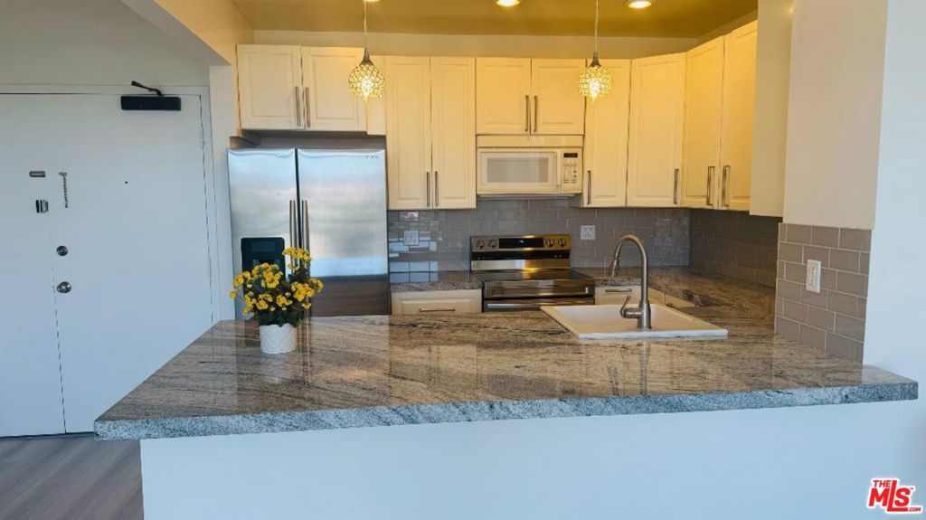 Photo of 10535 Wilshire Boulevard #1708, Los Angeles, CA 90024 (MLS # 25630115)