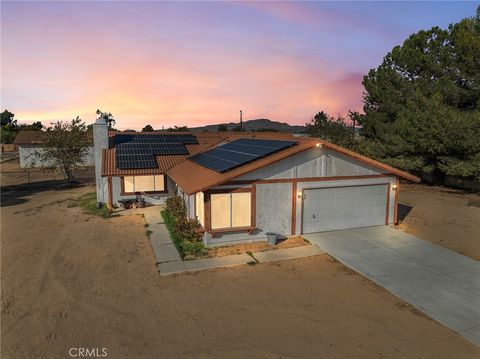 Photo of 14798 Dos Palmas Rd, Victorville, CA 92392 (MLS # HD25251071)