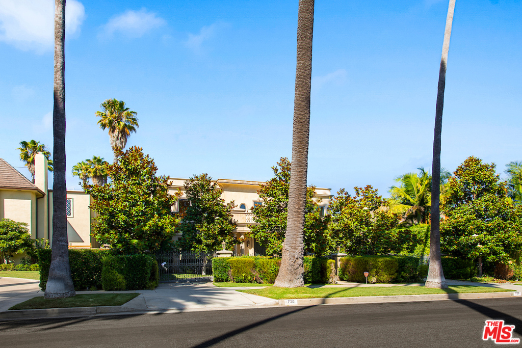 Gated and private Contemporary estate built in 2007 on premier 700 block in the flats of Beverly Hills. Large rooms with high ceilings throughout and lots of light. Wonderful wood and porcelain flooring creating a warm and inviting feel for the home. Commercial grade elevator. Large open family kitchen with fish tank island counter, double islands and top-of-the-line stainless steel appliances. 4 large suites up, including master bedroom with balcony overlooking the pool and grounds with spa bath, gym area and walk in closet. 2 separate office rooms upstairs. Fabulous infinity edge pool, spa, loads of entertaining space and barbecue kitchen with center gazebo. Maids room outside below parking area and pool for complete privacy. Beverly Hills School District.