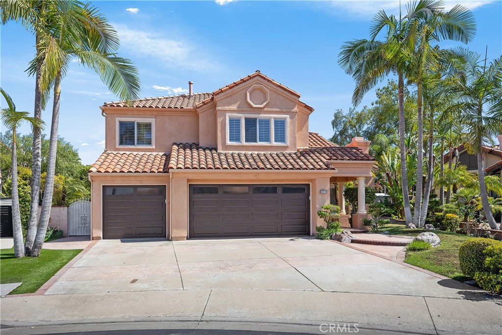 What An Incredible Value!, one of the largest lots in Canyon Crest with 9139 SQFT, this unique home with an indoor-outdoor living space, 5 bedrooms and 4 baths offers the extra space that you are looking for. The original floor plan has been customized with a recreation room off the family room, a big master retreat/office with big balcony & a fully finished third floor playroom, a total of 4186 SQFT. You enter through the double doors to a grand living room & dining room with beautiful hardwood flooring, vaulted ceilings and lots of natural lights. Family room opens to the recreational room addition, an area with approx. 478 SQFt for your indoor hobbies, such as table tennis, pool table or a playroom for kids. Chef’s kitchen has granite counter tops, center island, built in Monogram refrigerator, brand new double oven, big walk-in pantry, breakfast nook & a desk area for your daily use. Downstairs bedroom & bath have been remodeled and modified to be ADA approve. Master suite with remodeled bathroom & big walk-in closets opens to the attached retreat/office addition & a spacious balcony with redwood railings. Second balcony with spiral stair gives you access to backyard. Bonus room with built-ins has been enclosed to be the 5th bedroom and an additional 4th bathroom was added. The attic area is a fun space with access stairs from the hallway, fully carpeted, heated & air conditioned. The big backyard has been beautifully landscaped, one side with built-in BBQ is very spacious for entertaining and a gorgeous treehouse area, fun for kids or just a Zen area for adults to get away. On the other side there is a fire pit, a beautiful waterfall through lush mature palm trees, a spacious grassy area that used to be a putting green. Other features are plantation shutters, some new doors & windows, whole house water softener, ceiling fans, inside laundry room, brand-new garage doors and end of a cul-de-sac. Located In a coveted community of Canyon Crest with a multimillion-dollar recreational facility that offers an incredible banquet facility, a resort area with two pools, spa, baby pool, fully equipped gym, four tennis courts, basketball & volleyball courts, pickle ball Court, children’s playground, picnic and BBQ area. A short distance to the magnificent Lake Mission Viejo w/ year-round activities including fishing, boating, swimming, 4th of July fireworks, and street fair. Truly a joy for the entire family. Don’t miss the chance to make this property your home.