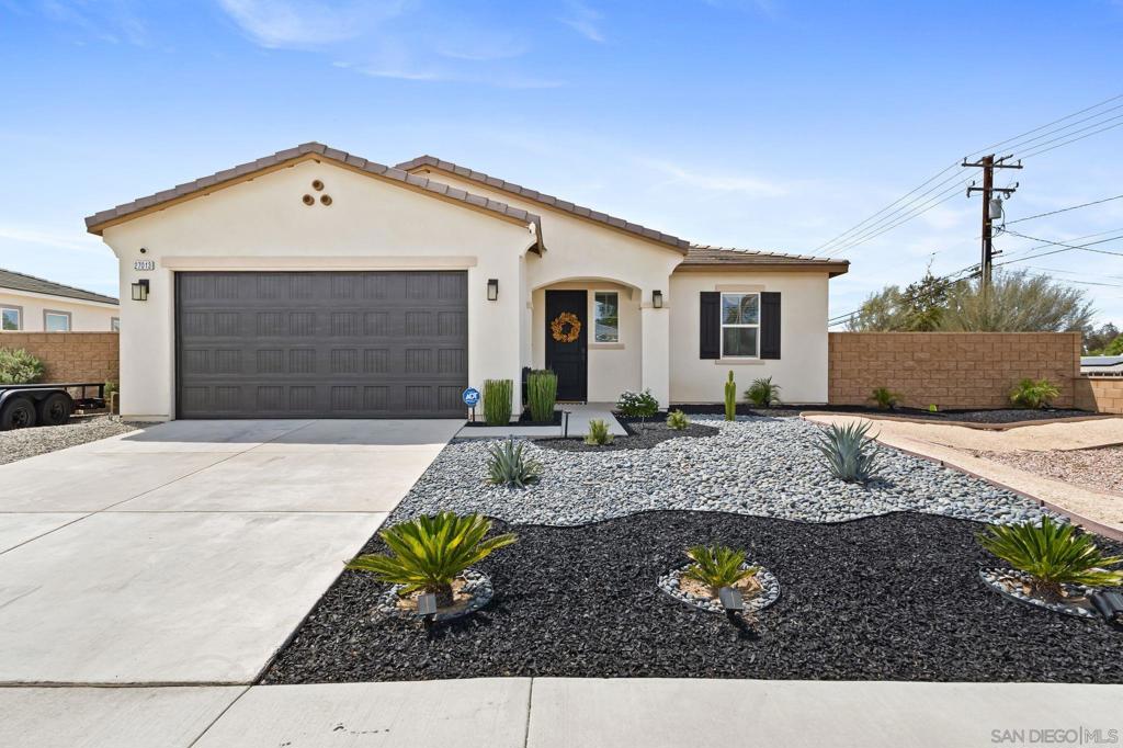 Welcome to this move-in ready single-story home built in 2021. Featuring 3 bedrooms, 2 bathrooms, and approx. 1,729 sq. ft. of living space on a 7,405 sq. ft. corner lot. The open floor plan offers vaulted ceilings, laminate wood flooring, carpeted bedrooms, and a modern kitchen with granite countertops, stainless steel appliances, and a large island. The primary suite includes a walk-in closet and dual vanity. Additional features: inside laundry room, 2-car garage, tankless water heater, solar panels, and RV parking potential. The backyard is ideal for entertaining with a covered patio and dedicated kids’ play area. Conveniently located near schools, shopping, and freeway access.