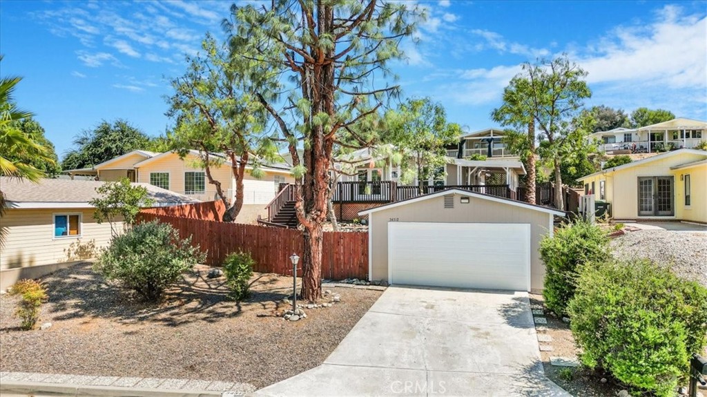YES, THIS BEAUTIFUL LIKE NEW VIEW HOME WILL KNOCK YOUR SOCKS OFF. WHEN YOU ENTER THIS HOME YOU WILL SEE A WONDERFUL NEW "ISLAND" KITCHEN WITH UPGRADED SAMSUNG STAINLESS STEEL APPLIANCES INCLUDING A 5 BURNER GRILL TOP STOVE WITH AN AIR FRYER CAPABLE OVEN. ALONG WITH HIGH END QUARTZ COUNTERS WHICH ARE ALSO INCLUDED IN BOTH BATHROOMS, A HUGE LIVING AND DINING AREA SURROUNDED BY LARGE NEW INSULATED VIEW WINDOWS OVERLOOKING THE DECKS AND PARK. NOT TO MENTION THIS HOME HAS NEW LAMINATE FLOORING THROUGHOUT. YOU WILL ENJOY THE LARGE MASTER BEDROOM WITH DUAL HIS AND HER SINKS INCLUDING A DRESSING AREA. LARGE PRIVATE LOT WITH SEPARATE 2 CAR GARAGE. ROOM FOR PARKING UP TO 4 VEHICLES. DID I MENTION, THAT YOU HAVE ACCESS TO YOUR OWN PRIVATE PARK ACROSS THE STREET WITH HIKING TRAILS INCLUDING A NATURAL WATERFALL CASCADING INTO A POND SURROUNDED BY PICNIC TABLES, RV PARKING, TENNIS AND PICKLEBALL COURTS, SOCCER FIELD, A FISHING LAKE, AND 3 SWIMMING POOLS. THIS IS THE WORKING MAN'S COUNTRY CLUB. WOW!
BROKER OWNER.