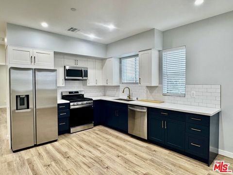 Photo of 5635 Homeside Avenue #5637 1/2, Los Angeles, CA 90016 (MLS # 26654261)