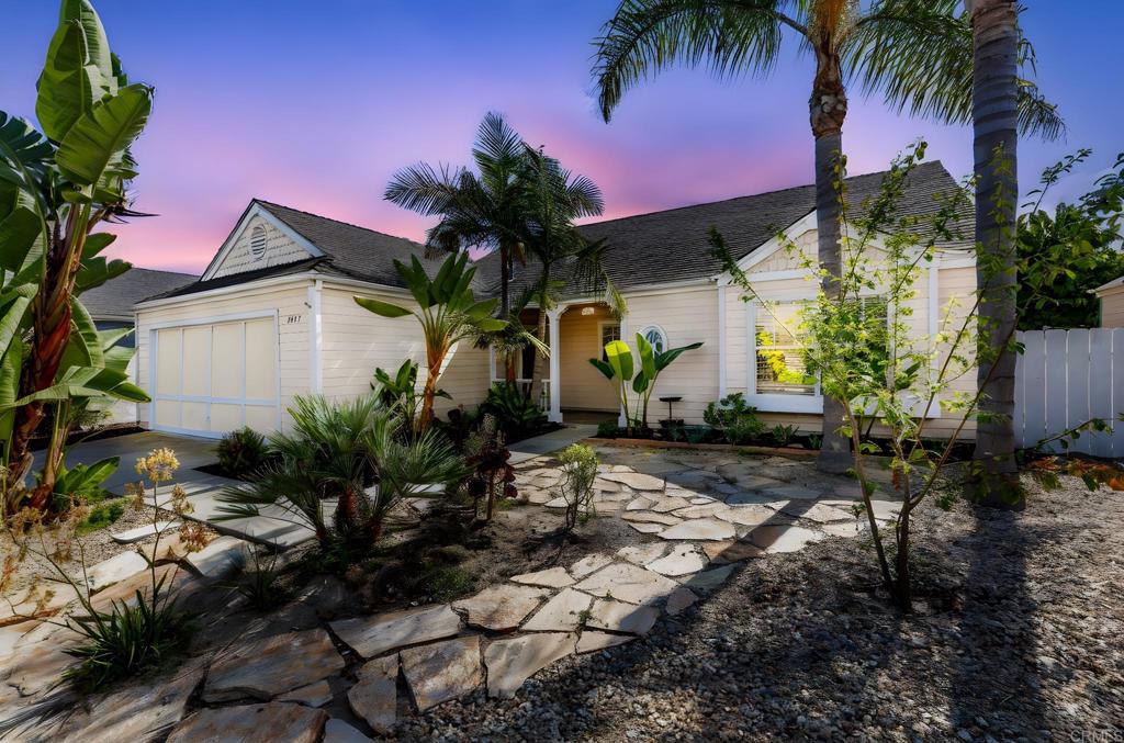 Coastal comfort meets modern ease in a great Oceanside location! At first glance, the xeriscape front yard creates the sense of curiosity to see more of this home. Once inside, the open airy floor plan invites both relaxation and connection, where the living room flows effortlessly into the kitchen area, where you'll always stay a part of the conversation. The kitchen supports ease of movement and plenty of work space where appliances are within reach. The Acacia wood floors capture the ambience as well as some carpeted areas of the home to accent the new paint that's been done recently. This home features 3 bedrooms where one can be an office space with French door entryway, and the 2nd and primary bedrooms, have ample space and comfort. You will also find one bathroom in the hallway for guests and another in the primary bedroom. Outside is a storage or exercise studio structure with A/C roomy enough to do just about anything that comes to mind. The large back yard is also a plus for family gatherings and parties, and let's not forget that you're just minutes from shopping and the beach that makes this location ideal and convenient. Another plus to this area, is there are no HOA'S.