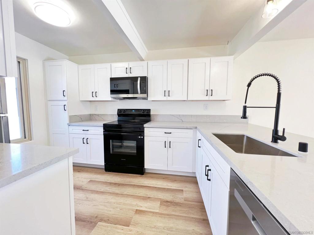 Welcome home! This fabulous 3B2B condo is fully remodeled by the owner! New kitchen, new appliances, new flooring, new painting. When you enter, you will be impressed by the open floor plan. Large master bedroom with 2 large closets, and all the bedrooms have a walk-in closet. Good sized balcony with privacy and view. This is one of the largest units in this gated community of Village Square. Conveniently located in Linda vista, walking distance to restaurants, supermarkets, 99 ranch, Target, Vons... Close to Costco, I-5, Clairemont. This is a good starter home for the young couples and a wise investment. The HOA covers your trash, water and sewer bill. One assigned parking carport. This community also offers 2 pools, Jacuzzis, BBQ areas. A must see!