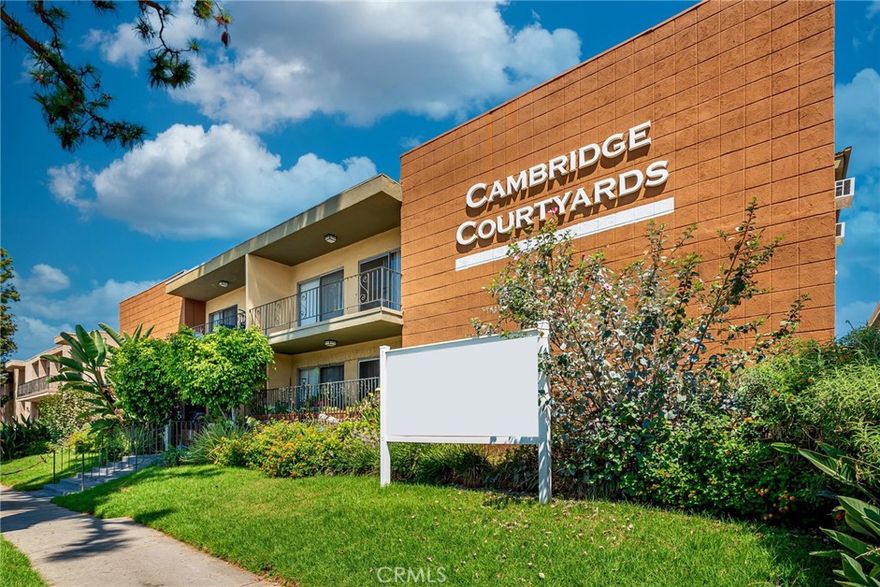 Located In The Prestigious Cambridge Courtyard * 2 Bedrooms / 1.5 Bathrooms * 975sqft est. * Laminate Floors *  Updated Kitchen With Granite Counters * Community Laundry * 1 Car Parking * Tenant Pays All Utilities
