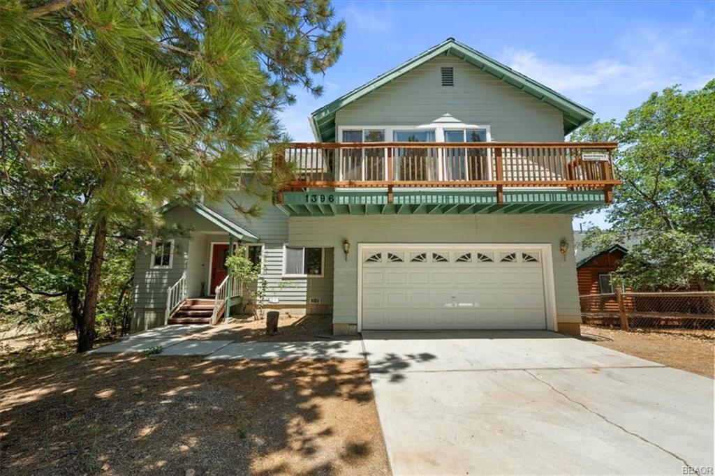 Looking to enjoy the mountain lifestyle full-time, part-time, or as a vacation rental? This charming 3-bedroom, 2-bathroom home offers the perfect mix of space, comfort, and location. Nestled in the sought-after Upper Moonridge area, it's close to Bear Mountain Ski Resort and offers ski slope views that remind you just how close to the action you really are. Whether you're into skiing, hiking, golfing, or simply relaxing, this location makes it all easy--with the Big Bear Alpine Zoo and golf course nearby, and yet still tucked away from the traffic and crowds. Spacious and versatile, the home has been a consistent vacation rental and is set up to handle it all--weekend getaways, full-time living, or passive income potential. It sits on a generous lot, with a fabulous backyard and ample deck space to soak in the fresh mountain air. There's plenty of room to grill, lounge, or host a snowball fight in winter. You'll also find lots of space to park and store all your seasonal gear, whether it's snowboards or golf clubs. Inside, 1,822 square feet of living space welcomes you with an open layout and a rustic mountain vibe. The large living room features high ceilings, warm wood accents, and a beautiful fireplace--great for warming up after a long day on the slopes. There's also a separate game room with a pool table, giving everyone a fun option when relaxing indoors. The kitchen flows right into the dining and living areas, making entertaining easy and natural. The primary bedroom includes its own bathroom for added privacy, and each of the three bedrooms are roomy enough to comfortably accommodate family, friends, or guests. In addition, the home comes furnished, per seller inventory--just bring your bags and you're ready to settle in. If you're searching for a move-in-ready cabin in a peaceful spot with stunning views and all the mountain access you could hope for, this one checks all the boxes.
