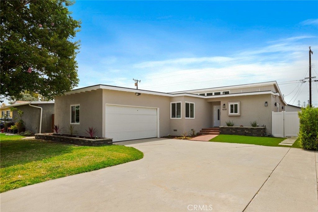 WELCOME to this beautiful cul-de-sac Home in the heart of Lakewood border line Cerritos Mall, this stunning completely remodeled 3-bedroom, 2-bath home offers the perfect mix of suburban charm and city convenience. There is an amazing bonus room which could easily be converted into a 4th bedroom and opens to the newly landscaped backyard with Spanish style flooring, perfect for relaxing or entertaining. Every detail has been thoughtfully updated, including dual-pane windows and stylish laminate flooring throughout. The modern kitchen includes brand-new LG appliances, Beautiful Island while the spacious laundry room features washer/dryer hookups for added convenience. Ready for more details? This home has a brand-new roof, upgraded electrical system, upgraded plumbing system and if that wasn't enough, central air and heat. The Attached two-car garage provides ample storage and parking, with exciting ADU potential. Ideally located just steps from Heartwell Golf Course and Park, and minutes from Cerritos Town Center, AND SKY ZONE AND offers easy access to premier shopping, dining, recreation as well as access to the best schools. Don't miss this move-in-ready gem in one of Lakewood's most desirable neighborhoods!