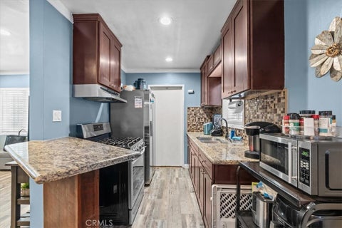 Photo of 407 E Sunset ST, Long Beach, CA 90805 (MLS # DW26180656)