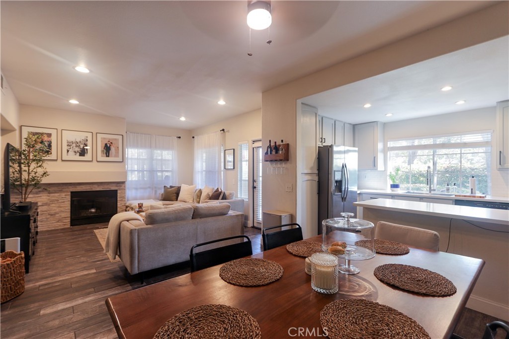 STOP!!! THIS NEWLY RENOVATED PROPERTY IN RANCHO SANTA MARGARITA IS PRICED TO SELL!!! Welcome to this beautifully updated condo in the heart of Rancho Santa Margarita! This home features a cozy fireplace, an upgraded kitchen with modern finishes, and newly renovated bathrooms in both the master and guest suites. Newer tile flooring adds a fresh and stylish touch throughout. Step outside to your spacious private patio — perfect for relaxing or entertaining — all within a quiet, well-maintained community. Ideally located right next to Tijeras Creek Golf Club and close to shopping, dining, parks, this condo offers the perfect combination of comfort, convenience, and lifestyle.