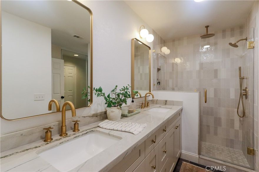 STOP!!! THIS NEWLY RENOVATED PROPERTY IN RANCHO SANTA MARGARITA IS PRICED TO SELL!!! Welcome to this beautifully updated condo Located on the ground floor with no steps throughout in the heart of Rancho Santa Margarita! This home features a cozy fireplace, an upgraded kitchen with modern finishes, and newly renovated bathrooms in both the master and guest suites as well as his and her closets in both bedrooms. Newer tile flooring and paint adds a fresh and stylish touch throughout. Both bedrooms feature a spacious private patio — perfect for relaxing or entertaining — all within a quiet, well-maintained community. Ideally located right next to Tijeras Creek Golf Club and close to shopping, dining, parks, this condo offers the perfect combination of comfort, convenience, and lifestyle.