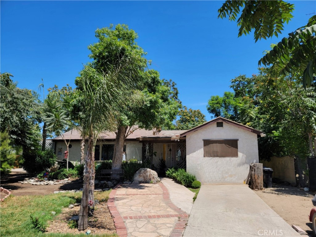 A unique opportunity with both immediate and long-term upside. Currently a single-family residence on a generous lot, this property lies within the Rialto Airport Specific Plan zone, offering flexibility for potential business, retail, other commercial, and light-industrial development (buyer to verify with the City of Rialto). Ideally located near major freeways, restaurants, and shopping, it’s a rare chance for investors, developers, or visionaries to capitalize on Rialto’s continued growth. https://library.municode.com/ca/rialto/codes/code_of_ordinances?nodeId=TIT18ZO_CH18.40PLINDEPIZO_18.40.020PEUS
