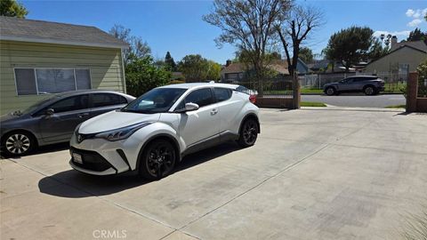 Photo of 19843 Enadia Rise, Winnetka, CA 91306 (MLS # SR26060001)