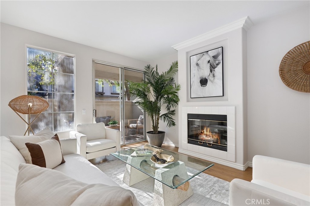 Experience the perfect blend of comfort and sophistication in this beautifully appointed single-level Foothill Ranch condominium. Nestled in a sought-after community, this elegant ground-floor residence offers a spacious and airy layout designed for effortless living. Step into the expansive primary suite, complete with a full en-suite bath that has a shining new vanity, providing a serene retreat at the end of the day. A well-appointed guest bedroom is conveniently located near the second full bathroom, boasting a new vanity as well, offering privacy and comfort for family or visitors. The inviting living area is warmed by a charming gas fireplace that seamlessly flows into the kitchen, which features a stylish pass-through opening and brand-new glistening cabinets and countertops that are perfect for entertaining and more. Just beyond, a spacious private patio offers an ideal setting for morning coffee or evening relaxation. The laundry room, conveniently located off the patio, provides additional storage and houses the water heater. This home includes a one-car garage conveniently positioned at the front of the unit for easy access. The resort-style community amenities feature a sparkling pool and rejuvenating jacuzzi, perfect for hosting gatherings or unwinding in a peaceful setting. Enjoy breathtaking views of Saddleback Mountain and the picturesque surrounding foothills, creating a stunning backdrop to your everyday life. Don’t miss the opportunity to make this exceptional residence your own!