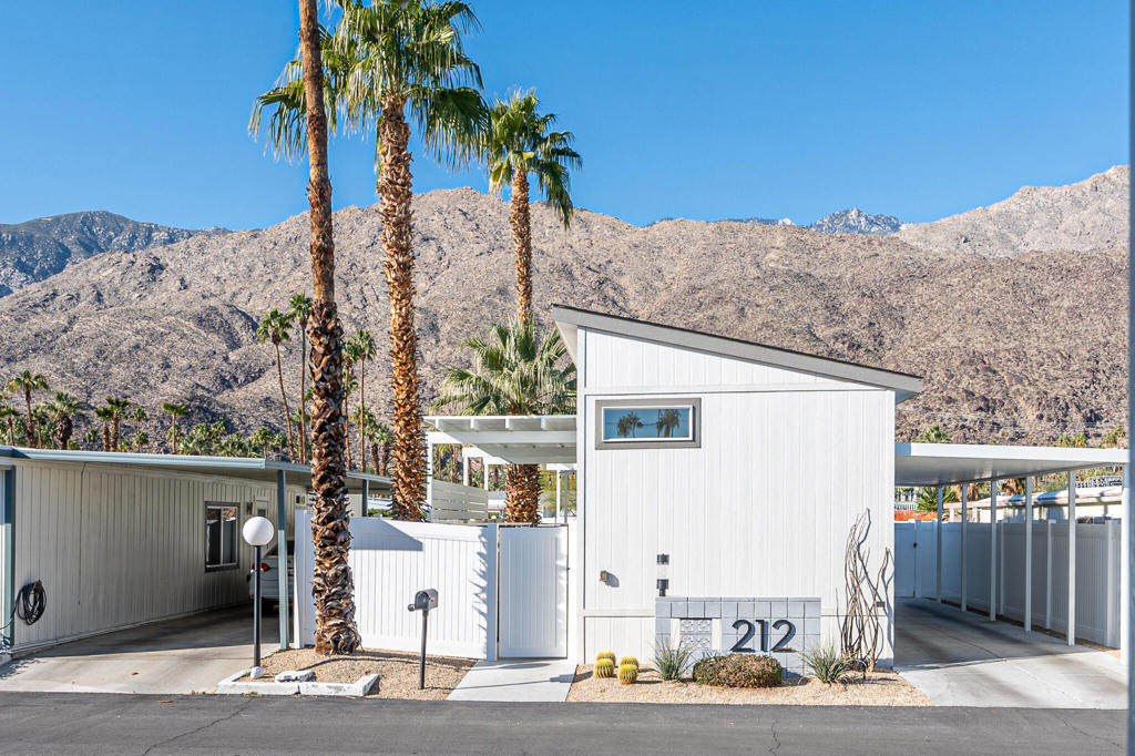 Not-so-tiny home living in the the best area of Palm Springs. This Sahara model home gives you spectacular mountain views from your living room and patio! MCM-inspired design and open floor plan is ideal for enjoying the indoor-outdoor lifestyle we cherish here. Light streams through clerestory windows. Glass sliders from the living room and master bedroom lead to outdoor decks. And the kitchen boasts stainless steel appliances. Best of all, this home is ideally situated within the upscale home community of Palm Canyon Mobile Club, with amenities such as a sparkling swimming pool, hot tub, gym, and dog park. Call listing agent today to make an appointment to see this home in person! Space rent: $1000/month.