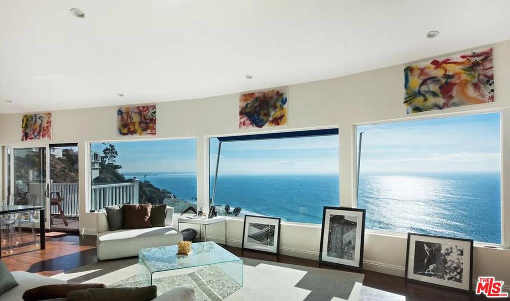 Breathtaking 180 degree ocean view home! This remodeled and stunning 3bd 2ba single level home features an open living room that flows to a chef's dream kitchen with high-end stainless steel appliances. Wall to wall windows to take advantage of the dramatic sunset views, remodeled baths with stone throughout, hardwood floors, and HVAC. There is a washer/dryer inside, direct access 2 car garage with plenty of extra street parking for guests, along with an expansive private lower garden. Available immediately!