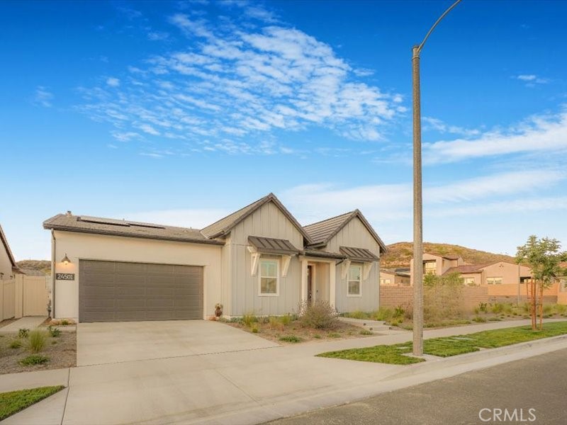 One-of-a-Kind Resort-Style Home on Rare Dual-Parcel Lot in Gated 55+ Community! Welcome to 24501 Via Sendero, a
stunning 2024-built residence located on a massive corner lot with two separate APNs (3244-161-036 & 3244-161-037)
in the highly desirable Estrada 3 at Tesoro Highlands Valencia community. This is one of the few homes offering such an
expansive lot, delivering privacy, space, and exceptional value. Experience elegant resort-style living in this immaculate
3-bedroom + office, 3.5-bathroom home with approximately 2,550 sq ft of open-concept luxury. Step inside to find
premium vinyl wood flooring, soaring high ceilings, and a thoughtfully designed layout ideal for comfort and
entertaining. The custom 4-panel sliding glass doors seamlessly connect indoor and outdoor living spaces. The chef’s
kitchen is a showstopper—equipped with a 6-burner gas range and built-in griddle, stainless steel appliances, a spacious
island with seating, modern countertops, designer backsplash, a dry bar, and abundant cabinetry. A walk-in pantry with
custom wood shelving and a large laundry room with ample storage add everyday convenience. Retreat to the luxurious
primary suite with direct patio access, a generous walk-in closet, and spacious bathroom ensuite featuring dual sinks
and a large walk-in shower with bench seating. All the 3 bedrooms feature ceiling fans with light fixtures for year-round
comfort. Enjoy California living at its best in the resort-style backyard with low maintenance paved backyard- ideal for
entertaining family and friends. Additional highlights include: Owned solar panels with a capacity of 10 Watts Tesla
Battery Central A/C & heating Tankless water heater EV charger 2-car attached garage with direct access Designer
lighting & chandeliers throughout. OPEN HOUSE FRIDAY, 9/5 BETWEEN 2-5 PM Enjoy premier 55+ gated living with
clubhouse access, recreational facilities, fitness center, swimming pools & spa, pickleball courts, dog park, and a full
calendar of lifestyle events and social activities are located right behind the house at a walking distance. Don’t miss this
rare opportunity to own a modern, move-in ready home with unmatched space and amenities in one of Valencia’s finest
active adult communities. Truly a place to call home.
EXCLUSIONS: INC