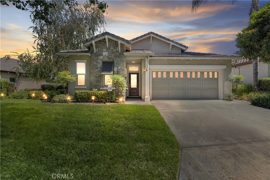 SELLER PAID (installed 2022) SOLAR. 'Stunning' Stack stone Exterior on this popular Sycamore model. Shows like a MODEL HOME! Home boasts family kitchen, family room, beautiful primary bedroom and flex room with its own sliding door patio access. Guest suite, inside laundry room. Beautiful larger backyard with hillside views, botanical back yard with ambience lighting. Nicely setback from the street for ultimate curb appeal. This 55+ community is highly desirable and offers resort style living at its best. See Community amenities for all this development offers - Enjoy the 62+ clubs for all interests. Don't miss this one!