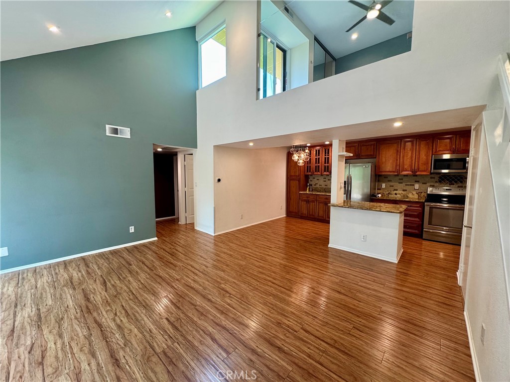 Welcome to this stunning 2 bedroom, 2 bathroom condo with a spacious loft, located in the heart of Lake Forest. This light-filled home features a remodeled kitchen with modern finishes, hardwood flooring, and two private balconies offering breathtaking mountain views. The open-concept living area is perfect for entertaining or relaxing in comfort. Enjoy the convenience of a 2-car garage and the amenities of a well-maintained HOA, including a sparkling community pool. Don’t miss this rare opportunity to lease a stylish, move-in ready home in a desirable neighborhood!