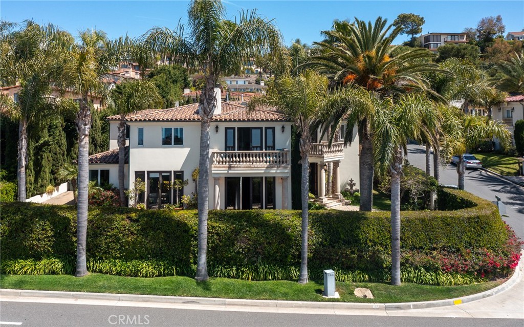 Welcome to 7460 Alida Place, a Mediterranean estate with endless potential, just steps from the scenic Palos Verdes bluffs. Positioned to capture sweeping 180-degree ocean views and refreshing coastal breezes, this property offers the rare chance to create your dream home in one of Rancho Palos Verdes’ most desirable settings. The residence features a well-designed floor plan with grand entry, sweeping staircase, formal living and dining rooms, spacious family room with wet bar, and a chef’s kitchen ready to be reimagined. A private guest suite is located on the main level, while the upstairs primary suite showcases stunning ocean views, a spa-inspired bath, and oversized walk-in closet. Cosmetic updates could elevate it into a showplace., its generous layout, timeless Mediterranean character, and premier bluffside location provide the perfect foundation for transformation. Blending classic charm with modern style for extraordinary coastal living. Part of the award-winning Palos Verdes Unified School district. Easy access to shopping center, with grocery stores, restaurants, golf courses and hiking trails.