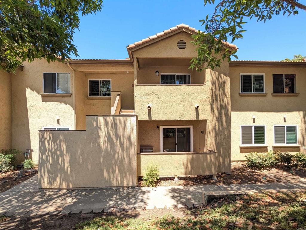 Live the good life in this ground floor elegantly updated cool condo which does not get road noise like many others in the resort-like community. Check out all the stone work in the bathrooms, crown molding, travertine floors, waterproof laminate wood style flooring, and granite counters throughout. Everyone loves having the bedrooms on opposite sides to give more privacy. 1 bedroom has a walk-in closet, the other has 2 closets. Fridge, washer, and dryer are included meaning you can move right in without doing a thing. This unit stays super cool so you won't feel the need to use the A/C. Recently installed dual pane windows and no road noise means you can enjoy peace and quiet inside, or out on the patio. Also, this building has the wood work already completed on the balconies, avoiding disturbances from that process. The 2 assigned parking spaces are nearby as well as the car charging stations, pool, spa, ample guest parking, and tennis.