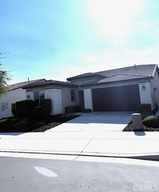 Move-In Ready Plan 2C Home in the 55+ Mira Neighborhood at Altis!
Welcome to this beautifully upgraded Plan 2C home, located in the highly sought-after Mira neighborhood within the award-winning Altis 55+ community. This move-in ready residence blends contemporary design, energy efficiency, and low-maintenance living—all in a vibrant, resort-style setting.
The chef-inspired kitchen showcases stained shaker cabinets, built-in recycle and trash bins, upgraded cabinet hardware, stunning quartz countertops, a custom tile backsplash, and designer-selected pendant lights above the island. A stainless steel single-basin sink with a pull-down faucet, stainless steel gas appliances, and a French door counter-depth refrigerator complete this elegant and functional space.
The open-concept great room is perfect for entertaining, featuring a 12-foot stacking door that creates seamless indoor-outdoor living. A versatile den with double doors offers the ideal space for a home office or guest room. The home is flat screen TV ready for effortless setup.
In the primary suite, you’ll find a beautifully tiled shower with a handheld shower on a slide bar, elongated toilets, framed bathroom mirrors, and stylish two-toned paint throughout. Convenience is key with a top-load washer and dryer already included.
Thoughtful details continue throughout the home, including upgraded flooring, window coverings, and a fully landscaped front and rear yard. Solar is included, offering both sustainability and savings.
Experience luxury living at its best in this exceptional Mira home at Altis. With high-end finishes and turnkey convenience, this home is ready for you to move in and start enjoying the lifestyle you deserve.