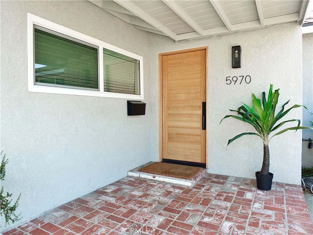 3 Units!!! 5970 Coke Avenue… a stunningly renovated 3 bedroom, 2 bathroom home of incredible quality, spaciousness and architectural drama boasting 2 equally appointed rear units… all with A/C units and state of the art services and appointments… tucked away in Long Beach… affording incredible income and lifestyle possibilities! The main house features an amazing open yet intimate living experience enjoying an open flow between the dining room, gourmet kitchen and expansive sun filled fireside living room. The kitchen includes ZLINE stainless steel appliances (including a 6 burner range), incredible cabinetry plus a central island/ breakfast bar and a walk-in pantry “room”. All 3 bedrooms are sun filled and feature ample wardrobe storage… and both bathrooms are stylish and beautifully appointed… including the primary suite with access to the private bathroom. Behind the home is a large yard. A long gated driveway/ motor court patio extends to the 2 rear units… each with great kitchens, lounging spaces, a bedroom plus access to private patios. Truly an awesome lifestyle and investment opportunity… quietly located between major freeways connecting to all of Southern California… in Long Beach!