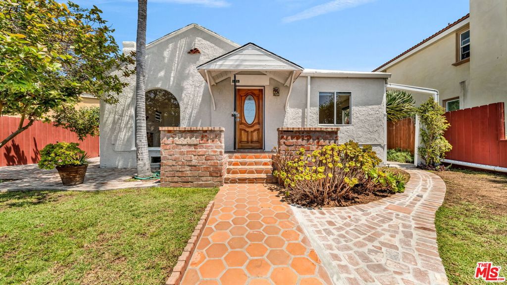 Newly renovated 4 bedroom, 3 bath home located perched above on 12th street north of Pico , westardly facing for welcoming ocean breezes. Entertainment areas abound with large living room and adjacent dining room which open to outdoor brick patio. Upper primary bedroom opens to a large balcony, perfect for lounging or working out. Balcony overlooks mature landscaping and fruit trees. Kitchen is state of the art with all new appliances. Laundry room is deluxe and fully equipped.