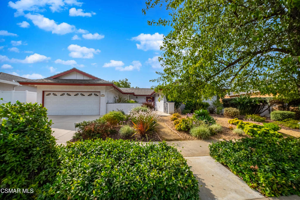 Highly sought after single story home in the heart of Thousand Oaks. Close to shopping, restaurants, parks and trails, and award winning schools. This light and bright filled home has 4 bedrooms and 2 bathrooms with an open floor plan. Enjoy a newer kitchen and bathrooms, two walk in master closets, dual pane windows, 5 burner gas range, and lots of storage in the kitchen and throughout the home. The home also has a family room, living room with gas fireplace and dining room, there is plenty of space to have friends and family over for all your celebrations. The expansive backyard has stunning views and includes an area for gardening and a side yard with several fruit trees. Weekly gardener included. Washer and dryer and refrigerator also included without warranty. Home is available for immediate move in. A must see!