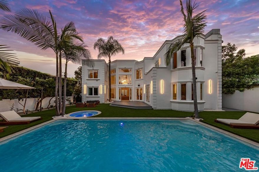 Welcome to this brand-new offering in the heart of the Beverly Hills Flats  a breathtaking 6,500+ sq.ft. architectural estate that embodies timeless elegance, modern sophistication, and unparalleled craftsmanship.Behind private gates and a grand circular driveway, this six-bedroom, seven-bathroom masterpiece defines luxury living at its finest. Step inside to soaring ceilings, expansive light-filled living spaces, and a seamless indoor-outdoor flow ideal for entertaining.The state-of-the-art chef's kitchen boasts brand-new professional-grade appliances, custom cabinetry, and an oversized center island that opens gracefully to the family and dining areas. Every detail has been meticulously curated for comfort and style  from the lavish primary suite with its spa-inspired bathroom to the fully integrated smart home system with surround sound and advanced security cameras throughout.Outdoors, discover a resort-style backyard oasis featuring a heated saltwater pool and jacuzzi, manicured gardens, and elegant lounge areas perfect for relaxation or gatherings under the California sun.Offered fully furnished or unfurnished, this remarkable residence represents a rare opportunity to experience refined Beverly Hills living on one of its most coveted streets. Available for lease with flexible terms. Cryptocurrency is accepted as a form of payment.