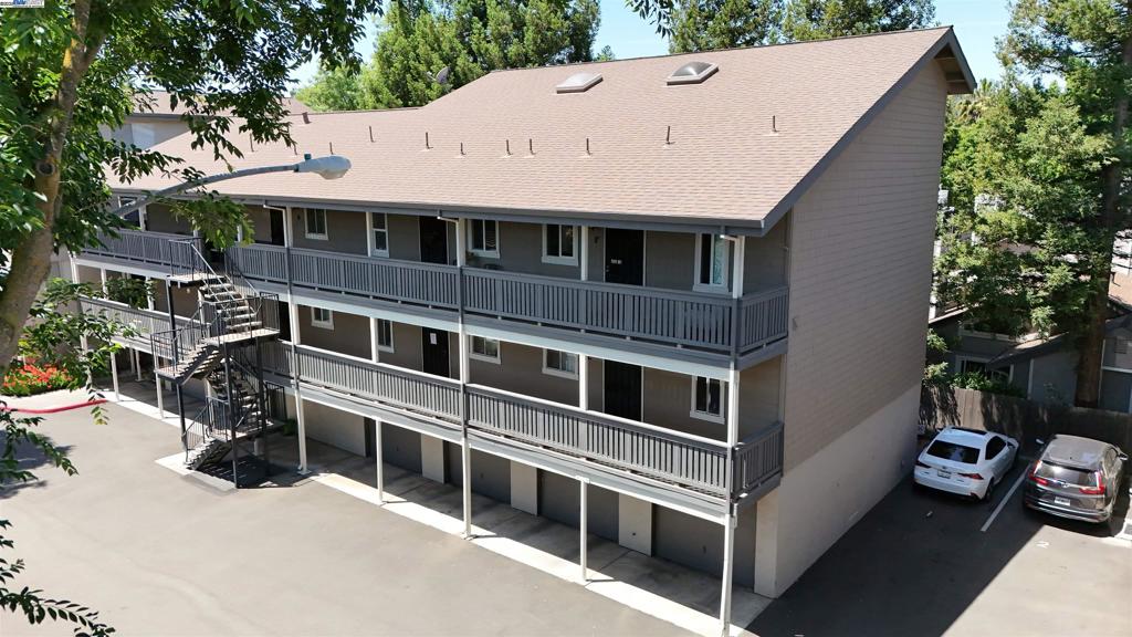 Discover your perfect haven in this bright and airy 2-bedroom, 2-bathroom penthouse-level, end-unit condo, perfectly positioned within walking distance to downtown Pleasanton. This east facing home features vaulted ceilings and large windows, ensuring every room is filled with natural light. Enjoy the ultimate convenience of in-unit laundry and a seamless open floor plan connecting the kitchen, dining, and living areas. The spacious primary offers full-floor living, while both bedrooms promise comfort and tranquility. Additional highlights include an oversized garage and an extra off-street parking spot, providing ample space and convenience. Situated in a vibrant community close to shops and restaurants, this condo offers a stylish and practical lifestyle, or a great investment property. Schedule your visit today!