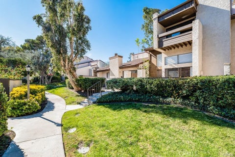 Photo of 5800 Owensmouth Avenue #14, Woodland Hills, CA 91367 (MLS # SR26134192)