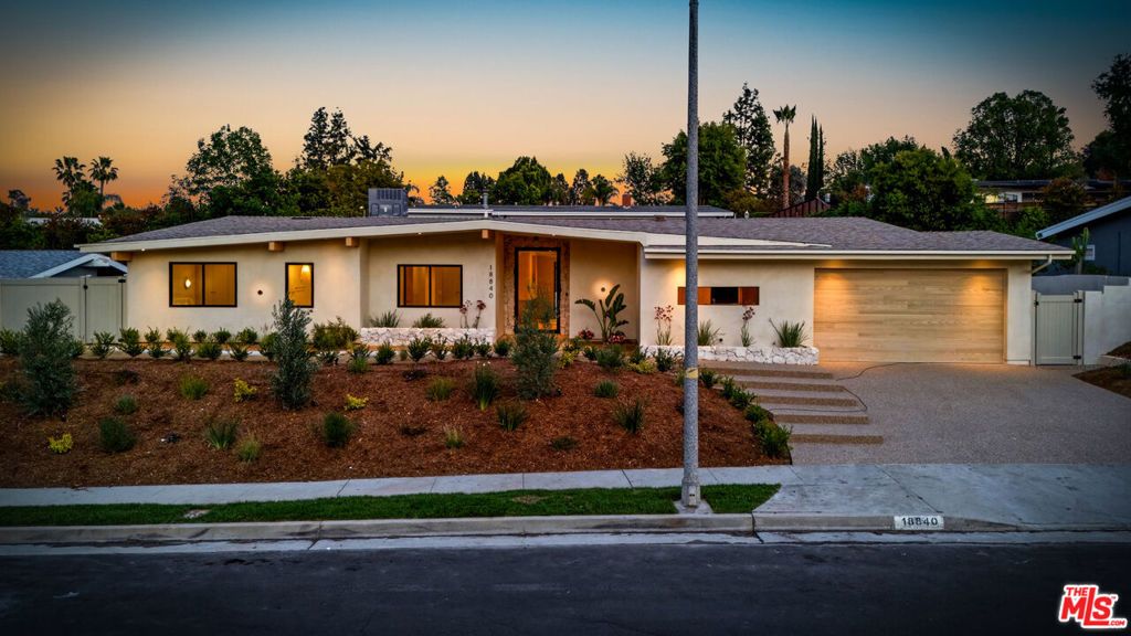 Photo of 18840 La Amistad Place, Tarzana, CA 91356 (MLS # 26829453)