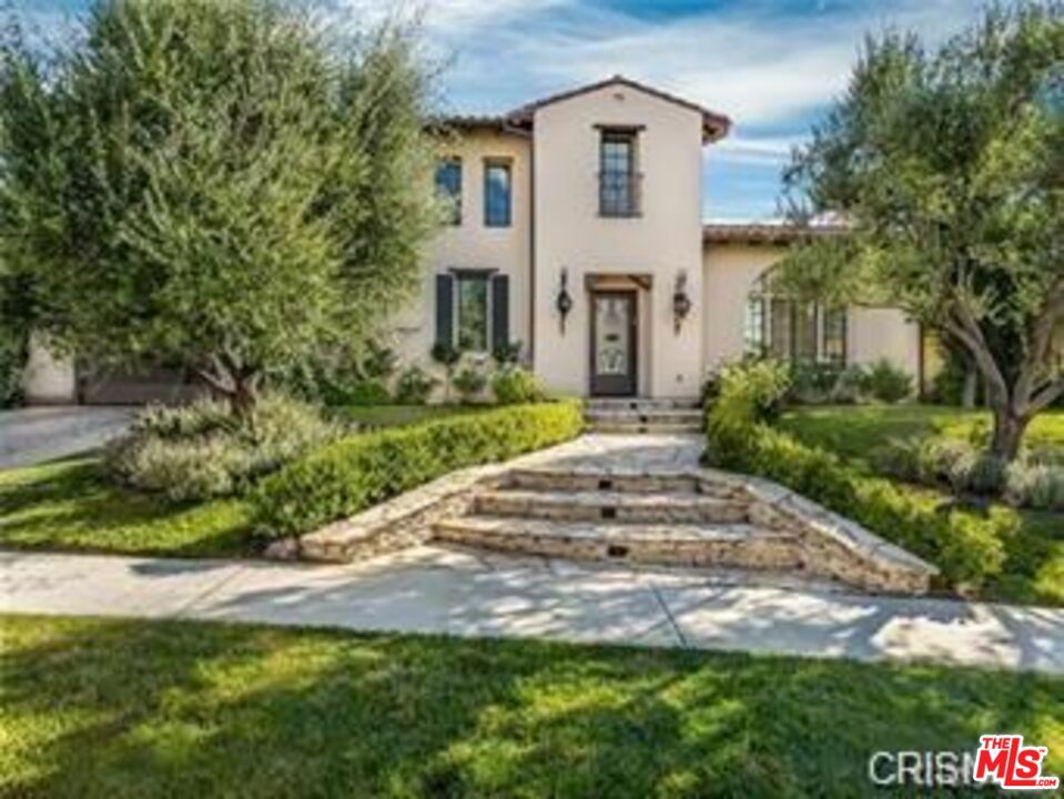 Custom Reserve Plan II in prestigious gated community of The Oaks of Calabasas. Extensively upgraded with professional interior details, this showcase estate sits on a premier lot, newly painted featuring light and bright interior, beautiful moldings and wainscoting. Gorgeous gourmet kitchen with huge center island, range and butler's pantry ready for 'family night'. Breathtaking formal entry with downstairs guest suite and library loft. Spacious master suite with retreat, fireplace and spa-like quarters. Entertainer's yard with sitting area built-in BBQ center, pool/spa and expansive conservancy views.