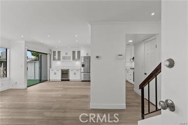 Recently Upgraded. Extended Kitchen Area with Wine Cooler, New Counters, Refrigerator, Stove/Cooktop Burners, Dishwasher, Living Room/Dining
Area, Fireplace, Laminate Flooring, Recess Lighting, Washer/Dryer Hookups in Kitchen Area, Guest Bathroom,