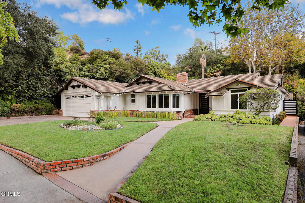 Nestled in a friendly, tree-lined Tujunga neighborhood, this beautifully remodeled single-story home offers the perfect blend of modern design and everyday comfort. The inviting open floor plan features three spacious bedrooms and two stylish updated bathrooms, along with a versatile office that could be transformed into a luxurious primary bathroom suite. The heart of the home is designed for both everyday living and entertaining, with bright, airy spaces that flow seamlessly from dining room to living room to eat-in kitchen. The stunning kitchen includes high-end appliances, custom kitchen cabinets with quartz countertops and a large island with counter seating. The two car attached garage with built-ins and laundry has direct access to the kitchen. Step outside to the private large grassy backyard, where multiple patio areas provide the ideal setting for outdoor dining, relaxation, or play. Additional amenities include updated electrical, plumbing, windows and doors, and new ducting. With its thoughtful updates, flexible layout, and prime location in a welcoming community, this home is ready to be enjoyed for years to come.