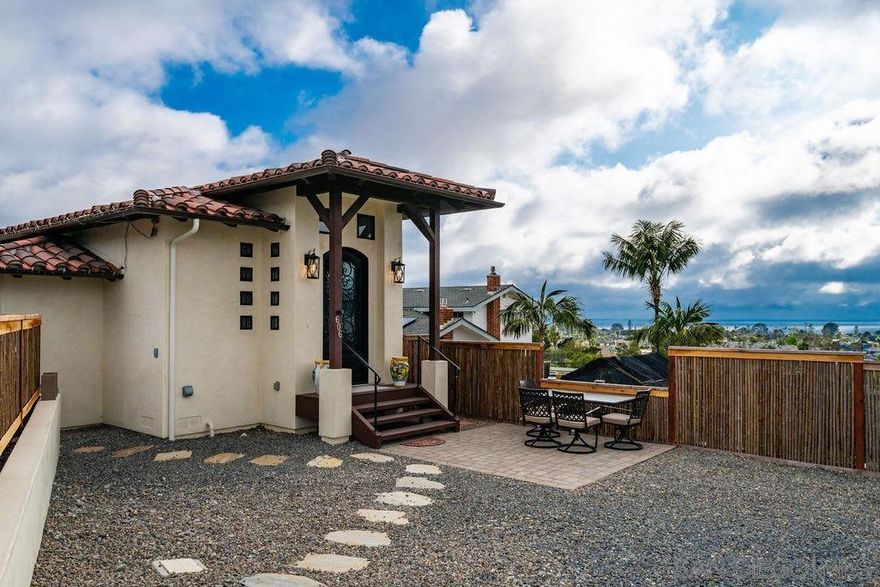 Fully furnished rental – Enchanting Encinitas Oceanview Casita Enjoy coastal living in this newly built 2BR/2.5BA Spanish-style detached casita with stunning ocean views. Located in the heart of Encinitas, just 10 minutes from Moonlight Beach, shops, and dining, this sunset sanctuary blends tranquility with sophistication. Enter through a gated private driveway to hardwood floors, high ceilings, and an airy, open layout. The living room and chef’s kitchen flow seamlessly, featuring stainless appliances, a large island with seating, and panoramic ocean vistas. Cozy up by the fireplace or relax on the comfortable sofa. The primary bedroom offers a queen bed with en-suite bath, dual vanity, and soaking tub; the second bedroom has a full daybed with trundle. Additional amenities include 2.5 elegantly finished bathrooms, fully paid solar, stacked washer/dryer, air conditioning, and small dogs allowed with approval. Experience the perfect combination of surf, sand, and sophisticated coastal living in Encinitas, known for its surf culture, nurseries, gardens, and iconic beaches. Maximum occupancy 5 guests. This is a furnished seasonal rental. Pricing varies by length of stay and seasonality. Published amounts are range estimates only. Final pricing, fees, and availability are subject to change until a fully executed lease agreement. Please inquire for exact quote and terms.