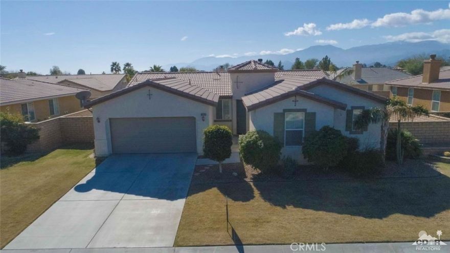 Best value in Talavera! One of North Indio's finest communities close to new stores, shopping and Shadow Hills High School. A fabulous location across from one on of Talavera's many parks. Beautiful Florenica Plan 1 opens to rotunda entrance with grand ceiling opens to spacious floor plan. Large tile leads to formal dining area and living area. Inviting fireplace in entertainment area next to kitchen. The kitchen boasts beautiful granite counter tops, granite back splash and granite bar eating area. Large Master bedroom includes bathroom with dual vanity sinks, separate soaking tub, walk-in shower and walk-in closet. Throughout the house you will find wonderful plantation shutters on all windows. Back yard is ready to entertain with a concrete patio and mature landscaping. On the east side of the house there is a large concrete slab ready for an RV or desert toys. A finished 2 car garage with built in shelf's. A must see!